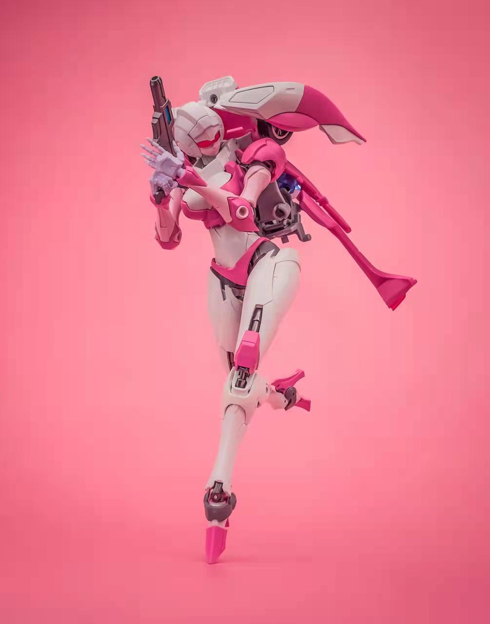Arcee with gun and glass